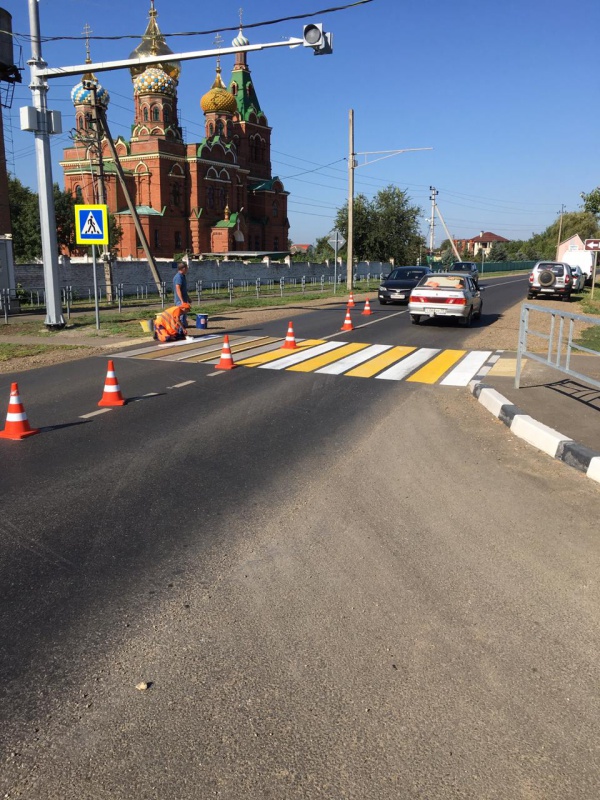 Нанесение дорожной разметки...