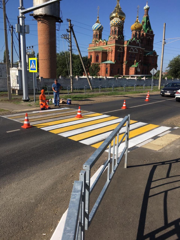 Нанесение дорожной разметки...